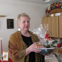 Rósa tekur við viðurkenningu Betadeildar